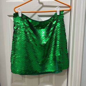Green sequin mini skirt.